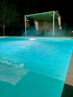 Strelitzia's house with heated pool from December 2024, private garden and private parking & wi-fi